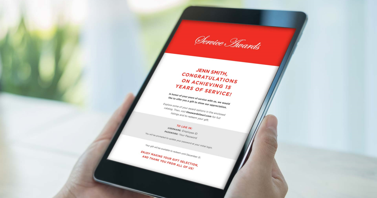 person viewing notification of years of service award on ipad